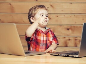 toddler with thumbs up